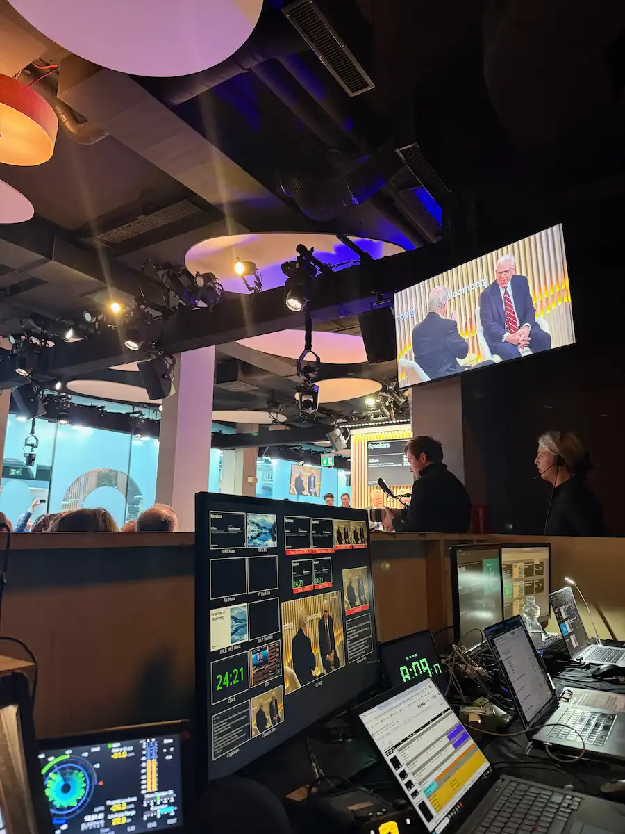 Technical view of stage with David Rubenstein and Al Gore mid interview.